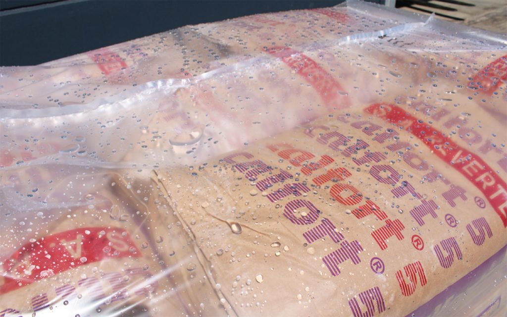 Waterproofed pallet of chemical bags with Stretch Hood System